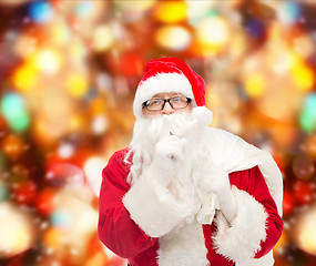 Image showing man in costume of santa claus with bag