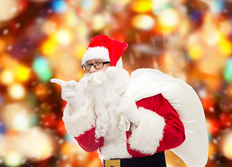 Image showing man in costume of santa claus with bag