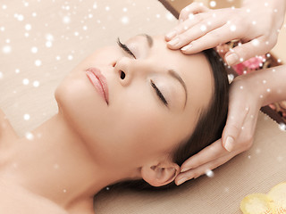 Image showing beautiful woman getting face or head massage