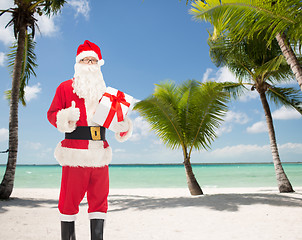 Image showing man in costume of santa claus with gift box