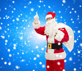 Image showing man in costume of santa claus with bag