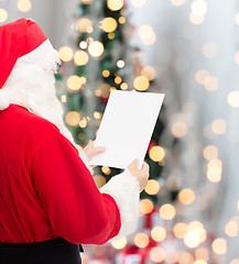 Image showing man in costume of santa claus with letter