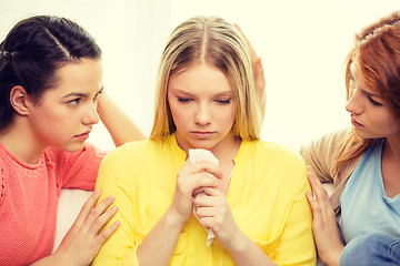 Image showing two teenage girls comforting another after breakup