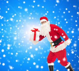 Image showing man in costume of santa claus with gift box