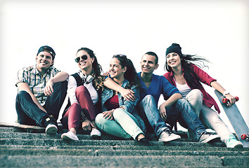 Image showing teenagers with skates outside