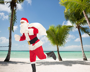 Image showing man in costume of santa claus with bag