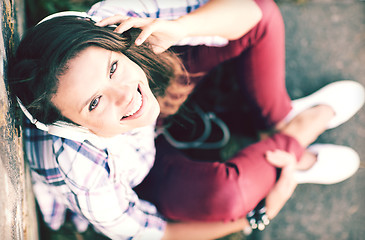 Image showing girl with headphones listening to music