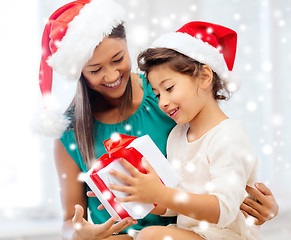 Image showing happy mother and child girl with gift box