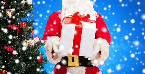 Image showing man in costume of santa claus with gift box