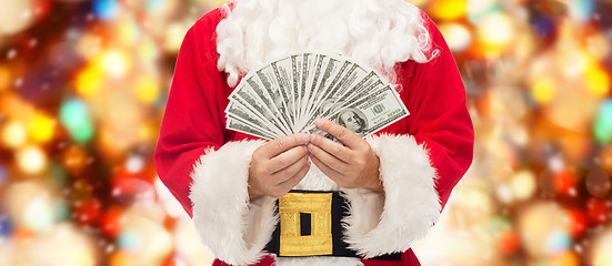 Image showing close up of santa claus with dollar money