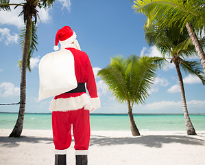 Image showing man in costume of santa claus with bag