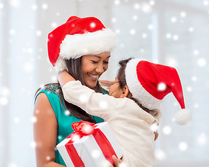 Image showing happy mother and child girl with gift box