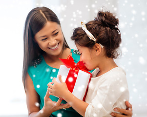 Image showing happy mother and child girl with gift box