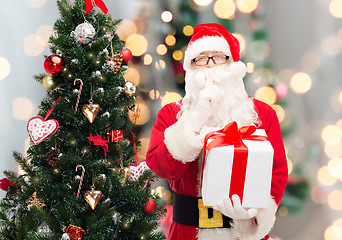 Image showing man in costume of santa claus with gift box