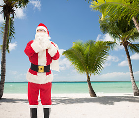 Image showing man in costume of santa claus with bag