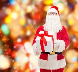 Image showing man in costume of santa claus with gift box