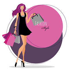 Image showing Fashion girl. Woman with shopping bags.