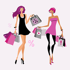 Image showing Fashion girl. Woman with shopping bags.