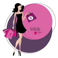 Image showing Fashion girl. Woman with shopping bags.