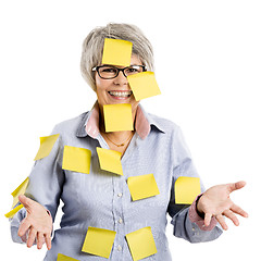 Image showing Elderly woman with yellow notes