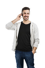 Image showing Young man talking on cell phone