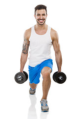 Image showing Athletic man lifting weights