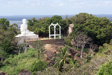 Image showing White Buddha and bell tower