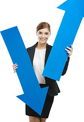 Image showing Business woman holding blue arrows