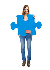 Image showing Woman holding a puzzle