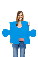 Image showing Woman holding a puzzle