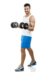 Image showing Athletic man lifting weights