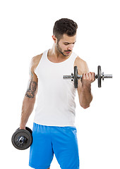 Image showing Athletic man lifting weights