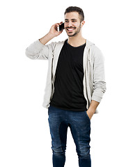 Image showing Young man talking on cell phone