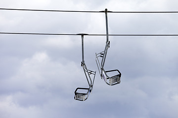 Image showing Chair-lift and overcast sky