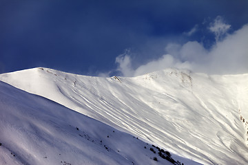 Image showing Off-piste slope in sun evening