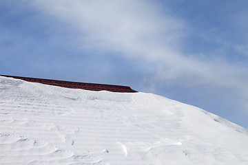 Image showing Roof in snow and blue sky