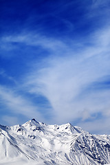 Image showing Winter snowy mountains at windy day