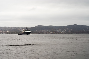 Image showing Cargo vessel is coming to port