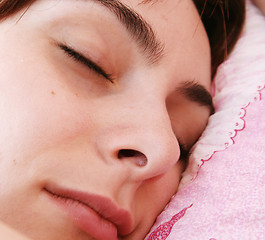 Image showing Beautiful young woman sleeping.