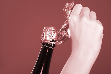 Image showing Opening champagne bottle