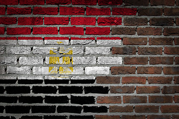 Image showing Brick wall texture with flag