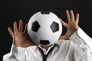 Image showing Attractive man with white shirt and football