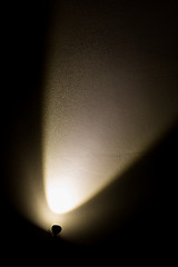 Image showing Dark Wall Illuminated from the Left Corner Spotlight Lamp