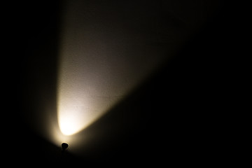 Image showing Dark Wall Illuminated from the Left Corner Spotlight Lamp