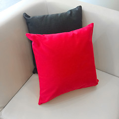 Image showing Sofa corner with red and gray cushions