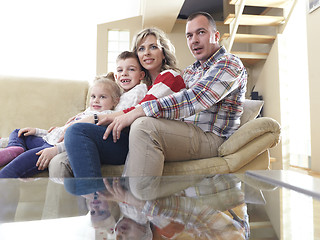 Image showing happy young family at home