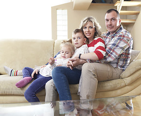 Image showing happy young family at home