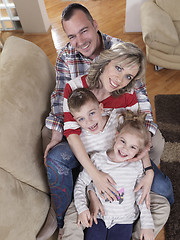 Image showing happy young family at home