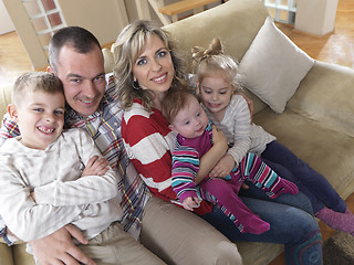 Image showing happy young family at home