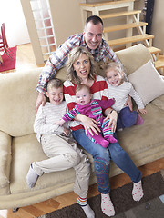 Image showing happy young family at home